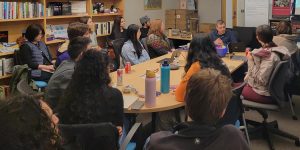  Professor Armen Khatchatourov from France talks with students at a Tech Policy Lab Discussion.